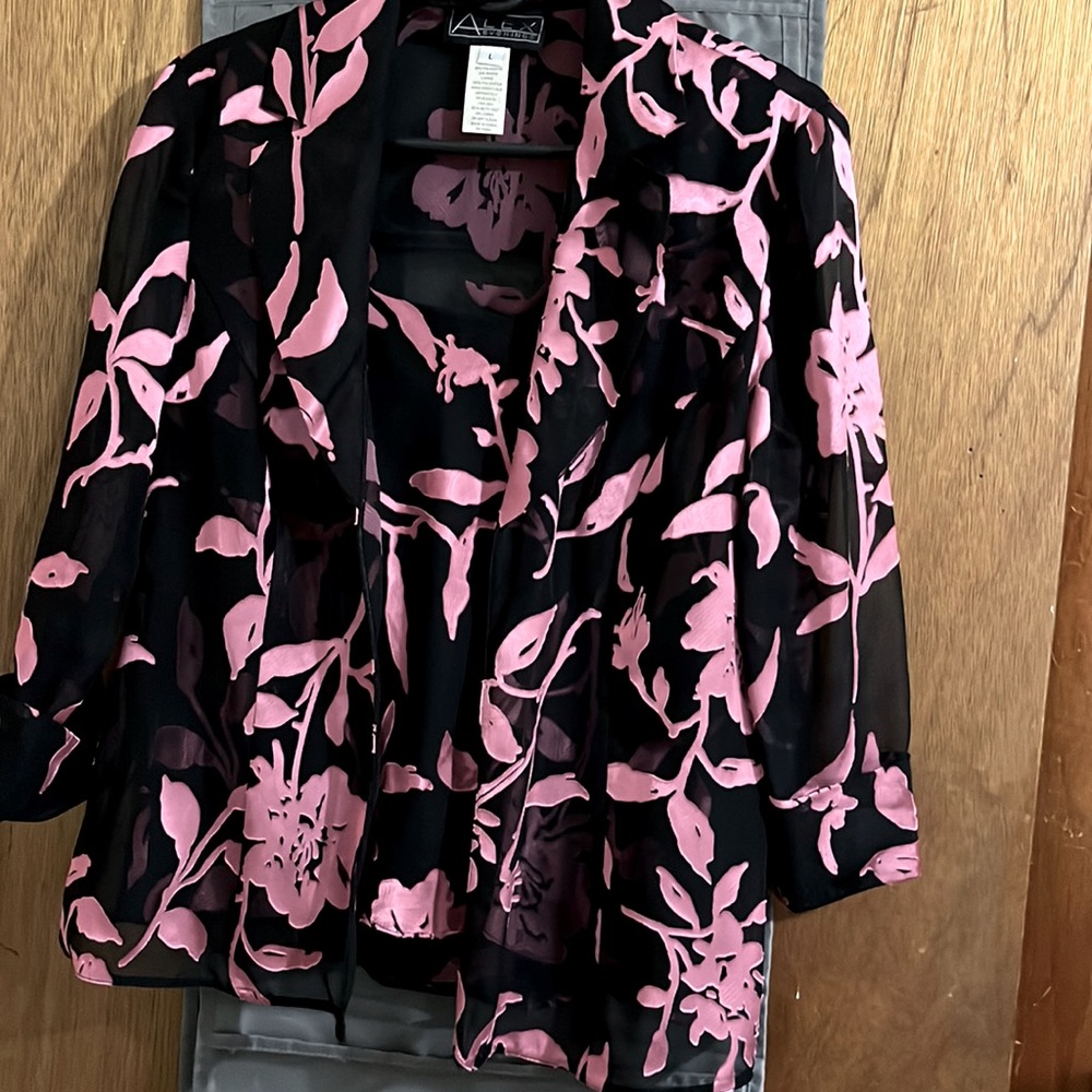 This is a two piece blouse and jacket